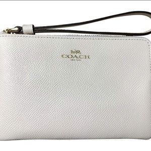 Never used/new with box 📦 Coach white wristlet